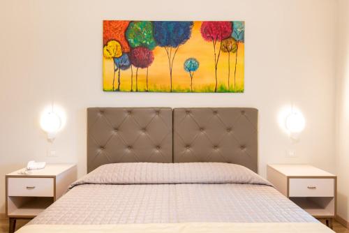 Ένα ή περισσότερα κρεβάτια σε δωμάτιο στο Hotel Atlantico