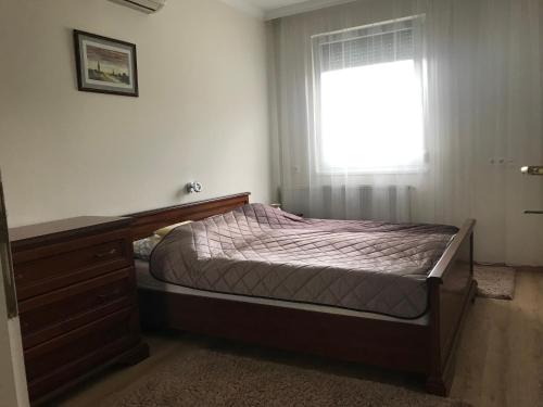 Posteľ alebo postele v izbe v ubytovaní Boruzs Apartman