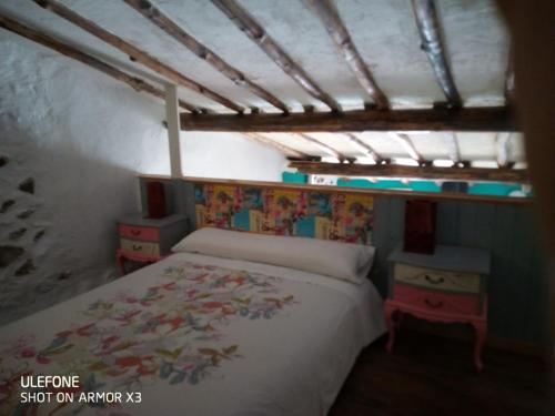 Cama o camas de una habitación en Atardecer en Gredos 1