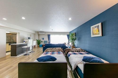 Katil atau katil-katil dalam bilik di Villa BluMare Shirahama