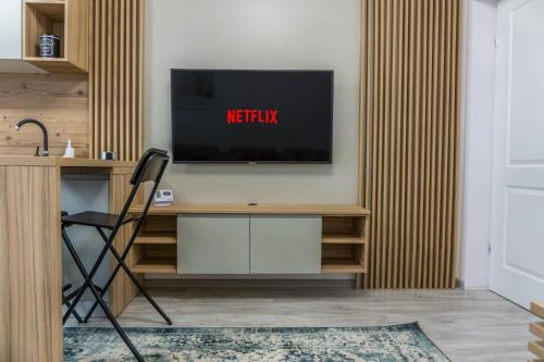 TV a/nebo společenská místnost v ubytování KOA - NorthSide Apartment