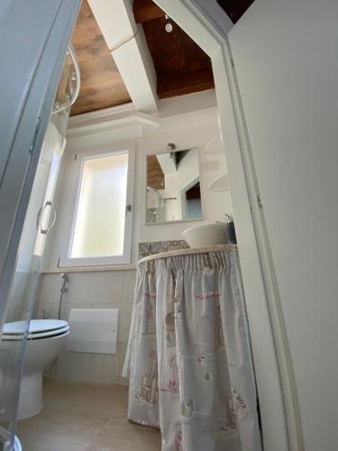 Koupelna v ubytování Lu Bàtil B&B - Rooms
