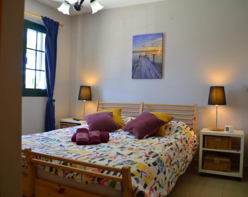 Postel nebo postele na pokoji v ubytování Relaxing Duplex Costa Teguise