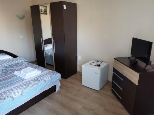 Ένα ή περισσότερα κρεβάτια σε δωμάτιο στο Guest Rooms Mihaylovi