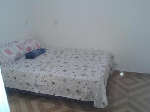 Cama o camas de una habitación en Dani Hostel e Suítes