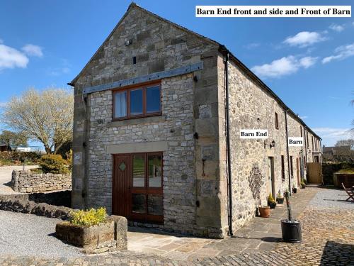an old stone building with the name ramart fraud front and side and front at Chestnut Farm Holiday Cottages in Matlock