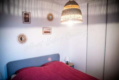 En eller flere senge i et værelse på Le Samélie, Superbe appartement Bray-Dunes avec stationnement privatif