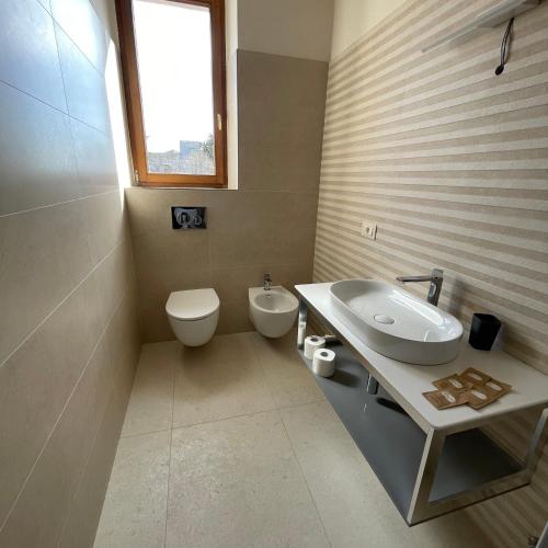 Et badeværelse på Charming 1-Bed Apartment in Montepulciano