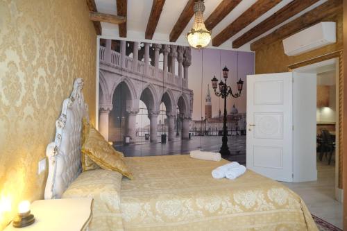 a bedroom with a large bed in a building at La Residenza di Carlo close to Piazza San marco in Venice