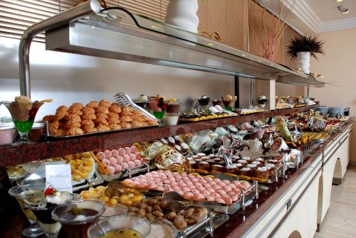 a buffet line with many different types of food at Panorama Hotel - All Inclusive in Alanya