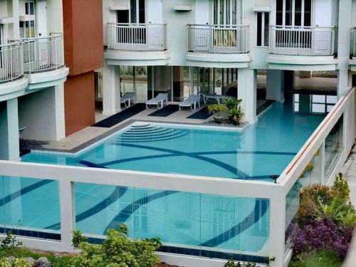 an overhead view of an apartment building with a swimming pool at Evelyn's Place at Tagaytay 2 in Tagaytay