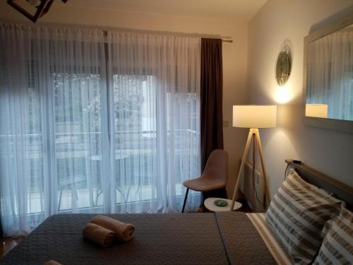 Ένα ή περισσότερα κρεβάτια σε δωμάτιο στο Apartman Nice