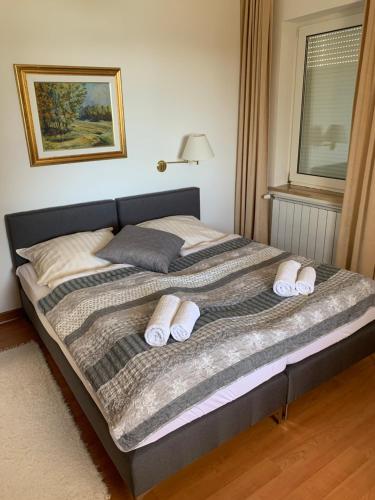 Posteľ alebo postele v izbe v ubytovaní Villa Alexandra Szentantalfa