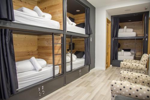 Postel nebo postele na pokoji v ubytování Tinto Dreams Hostel