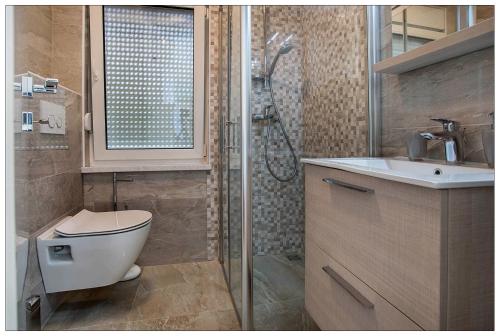 Kúpeľňa v ubytovaní AMALIJA APARTMENT