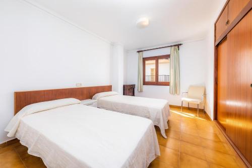 Postel nebo postele na pokoji v ubytování Vives