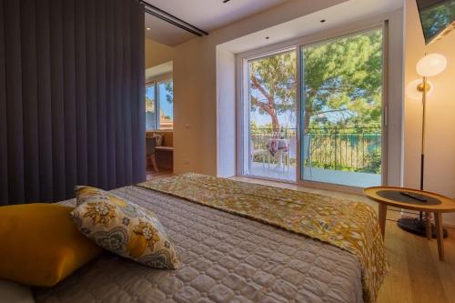 Posteľ alebo postele v izbe v ubytovaní Domus Aurea Luxury Apartment Cefalù