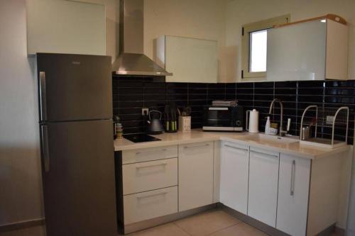 A kitchen or kitchenette at Caesarea Magic