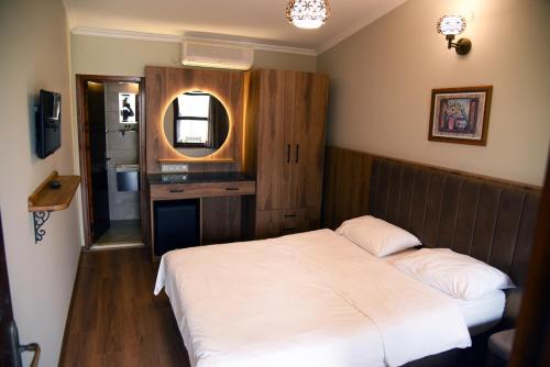 Postel nebo postele na pokoji v ubytování Fener Motel