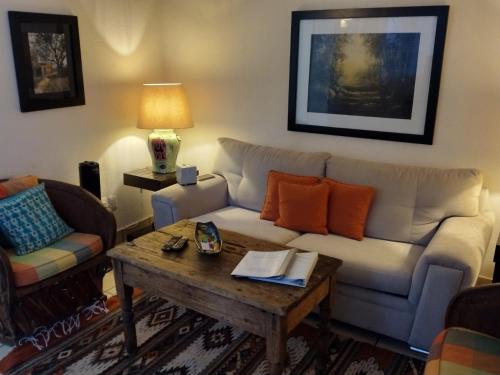 Posezení v ubytování Pied à Terre at Casitas Aparicio