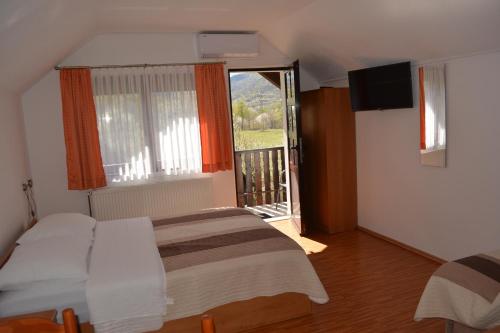 Postel nebo postele na pokoji v ubytování Guesthouse Andja