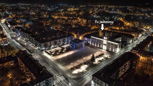 an aerial view of a city at night at Apartament Anastazja in Koszalin