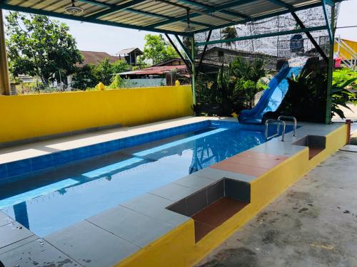 Πισίνα στο ή κοντά στο Homestay Tok Abah Dalam Rhu