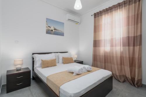 Postel nebo postele na pokoji v ubytování Emanouela's apartement in the center of Adamas