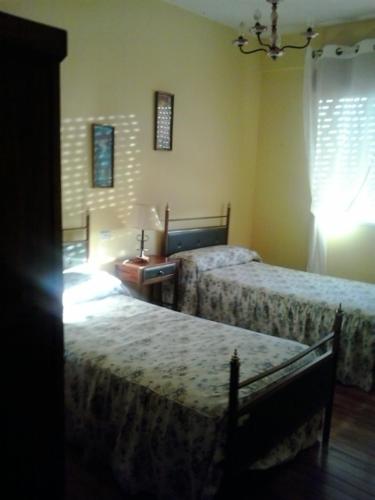 Postel nebo postele na pokoji v ubytování La Pitorra