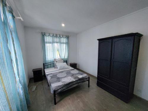 Ένα ή περισσότερα κρεβάτια σε δωμάτιο στο Villa Eglantine