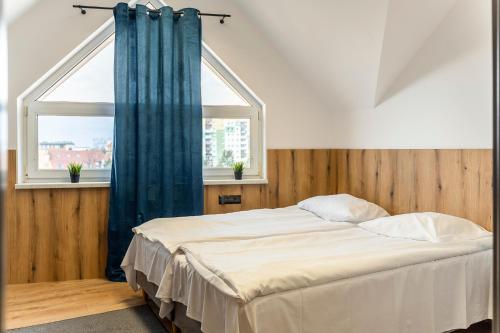 Postel nebo postele na pokoji v ubytování Gems Hostel