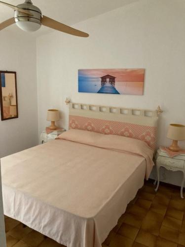 Postel nebo postele na pokoji v ubytování Olbia Osseddu House
