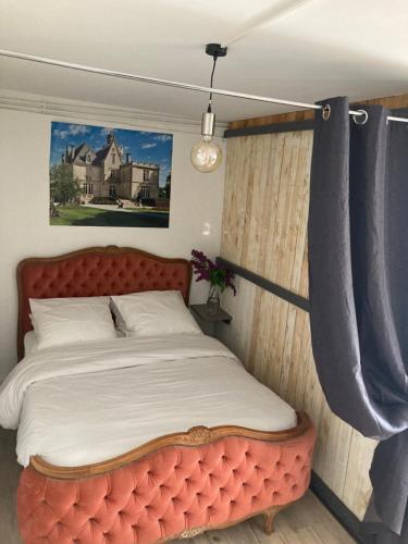 Posteľ alebo postele v izbe v ubytovaní Studio avec grande terrasse et jardin privatif au Pyla