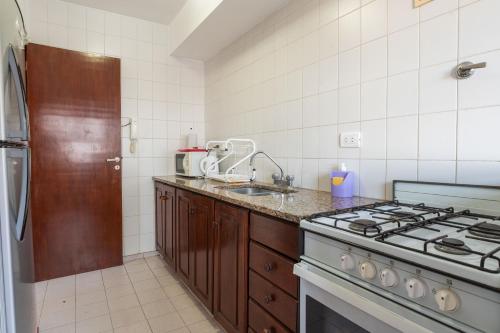Edificio Las Arenas tesisinde mutfak veya mini mutfak