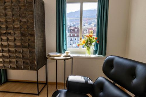 Un lugar para sentarse en River Residence