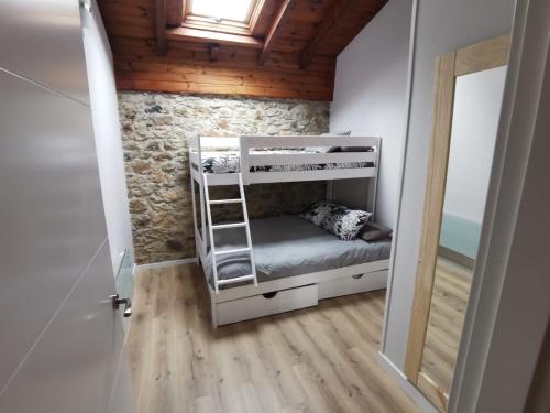 Postel nebo postele na pokoji v ubytování La Cabaña de Naia