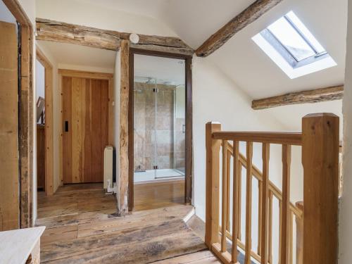 a hallway of a house with a skylight at Kentmere Fell Views in Kendal