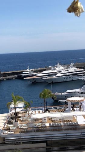 two large ships are docked in a harbor at FABULOUS BUNGALOW , WIFI, SWIMMING POOL AND BEACH in Pasito Blanco