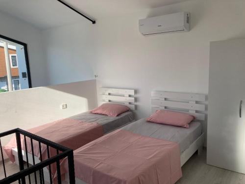 מיטה או מיטות בחדר ב-Villa Eliz