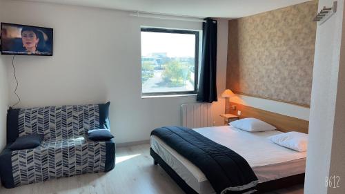 Katil atau katil-katil dalam bilik di Appartement Futuroscope-P'