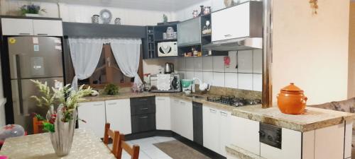 Kuchyň nebo kuchyňský kout v ubytování Pousada Aconchego serrano