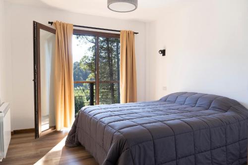 Llit o llits en una habitació de Colina de Ciprés
