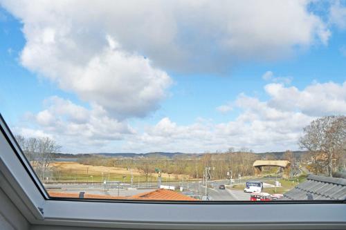 a view from a window of a road and a sky at Ferienwohnung mit Balkon am Mönchgraben in Baabe