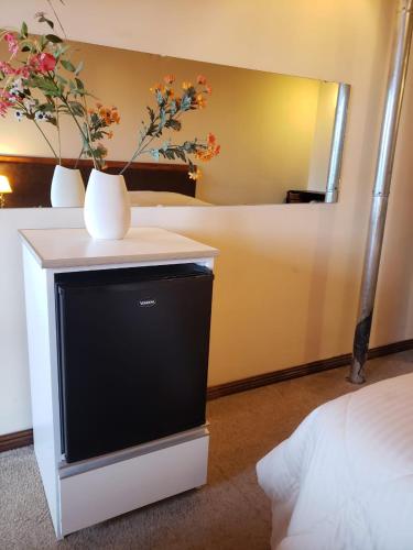 Postel nebo postele na pokoji v ubytování Tango B&B