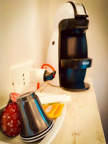a coffee maker sitting on top of a counter at Residenza B&B VistaMare in Petacciato