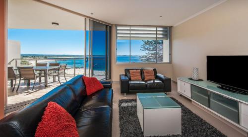 Μια τηλεόραση ή/και κέντρο ψυχαγωγίας στο Sandcastle Apartments