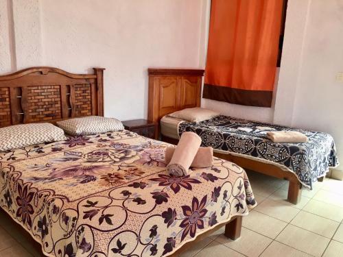 Cama o camas de una habitación en Posada Las Graditas