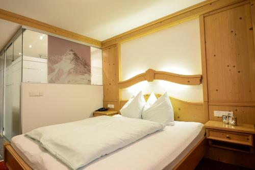 Cama o camas de una habitación en Alp Larain B&B
