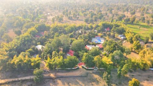 an aerial view of a house in a forest at Bundela Bandhavgarh by Octave in Mānpur