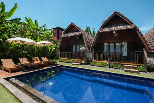 an image of a villa with a swimming pool at Loka Loka Ubud in Gianyar